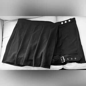 Black Mini Skort with Soft Pleats and Metal Embellishments